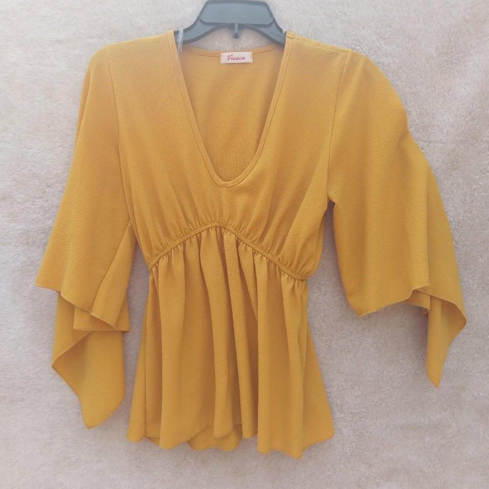 Mustard blouse with flowy sleeves
